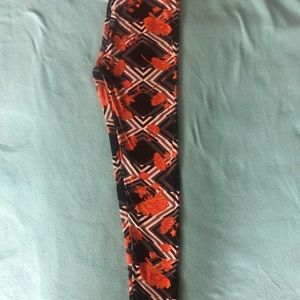 LuLaRoe Black Geometric design with Orange Flowers
